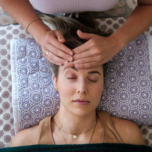 Patient resting during a Reiki session